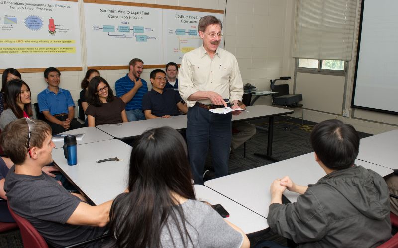 image of a professor speaking to a classroom